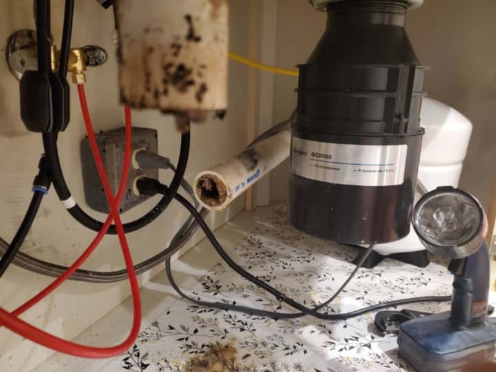 Clogged garbage disposal out line.